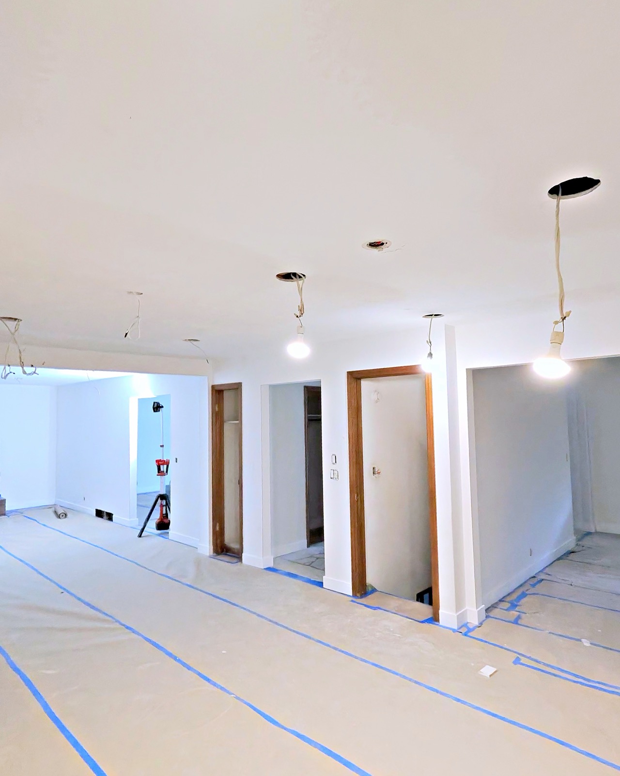 Finished drywall across an open main floor, Omaha metro